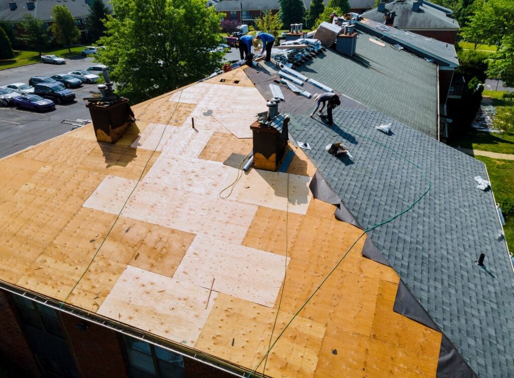how to get insurance to pay for roof replacement Roof repairs old roof replacement with new shingles of an apartment building