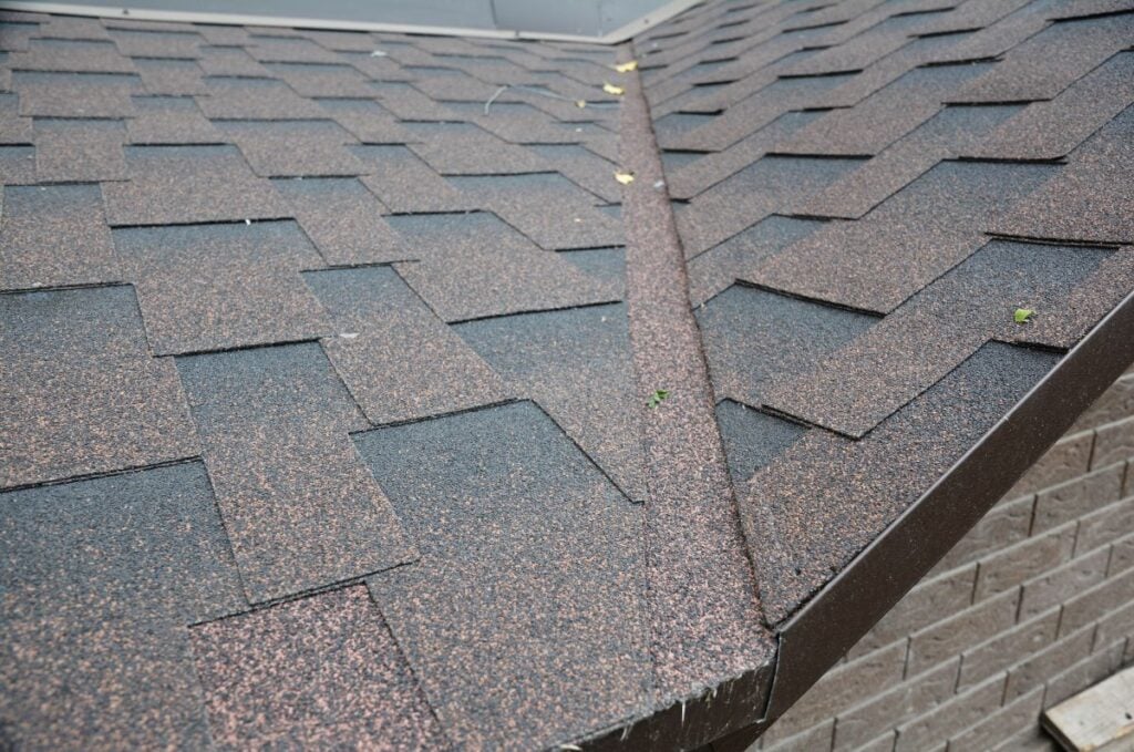 roof valley leak brown shingles big house