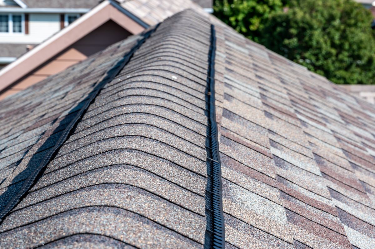 what is a ridge cap on a roof light grey shingles close up