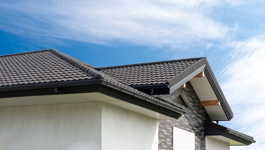 what is a ridge cap on a roof metallic tiles and stone wall
