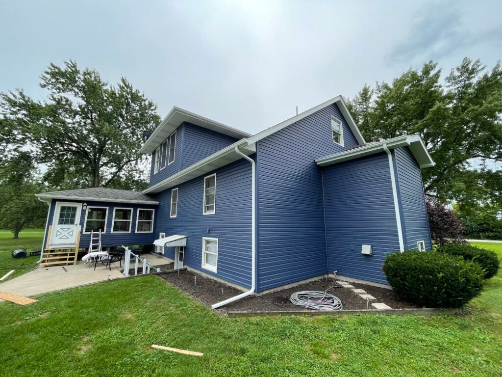 composite siding dark blue siding big house
