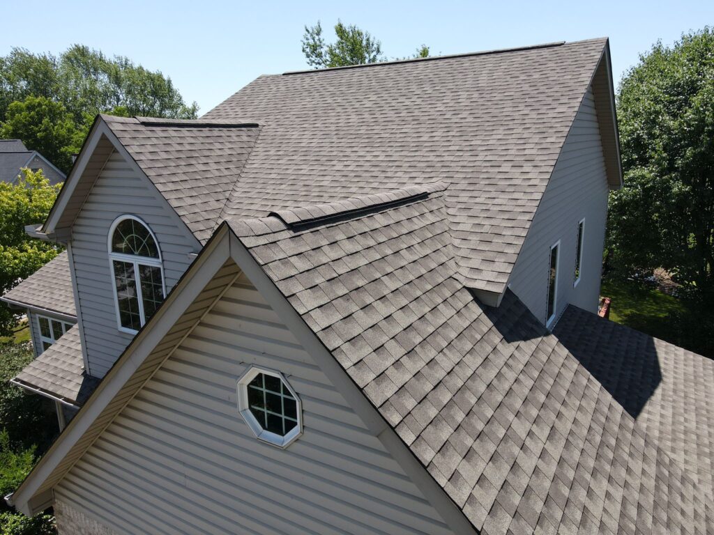 synthetic roof underlayment vs felt grey shingles roof big house