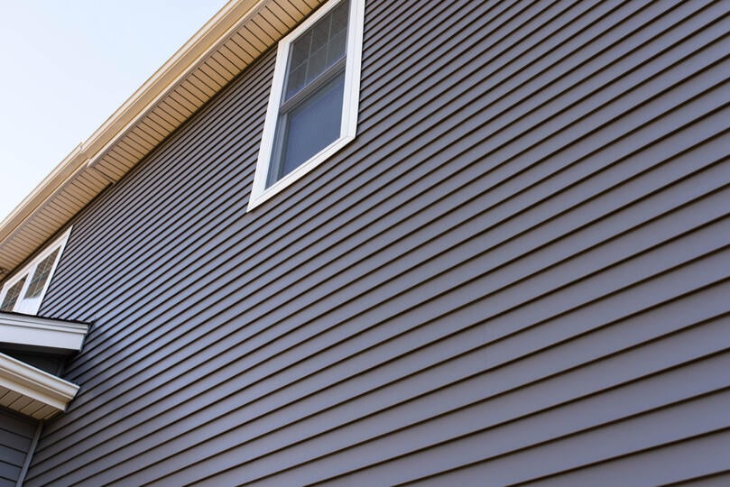 dark grey siding small window
