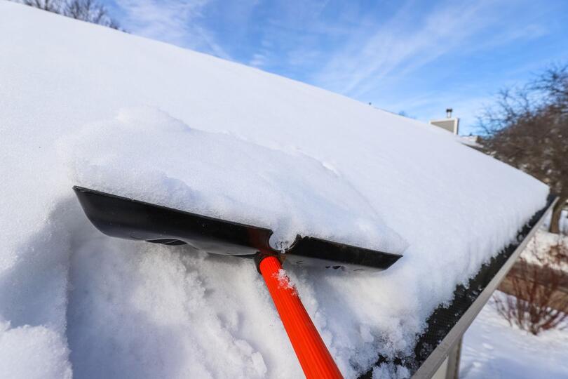 ice dam removal using shovel