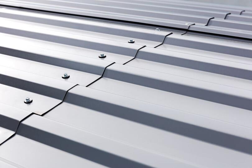 close up of grey corrugated metal sheet